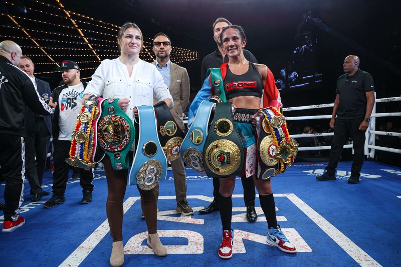 February 4, 2023; New York, NY, USA; Amanda Serrano and Katie Taylor pose for photos after Serrano’s win over Erika Cruz for the Undisputed World Featherweight Championship after their fight at the Hulu Theater at Madison Square Garden in New York, New York. Mandatory Credit: Ed Mulholland/Matchroom.